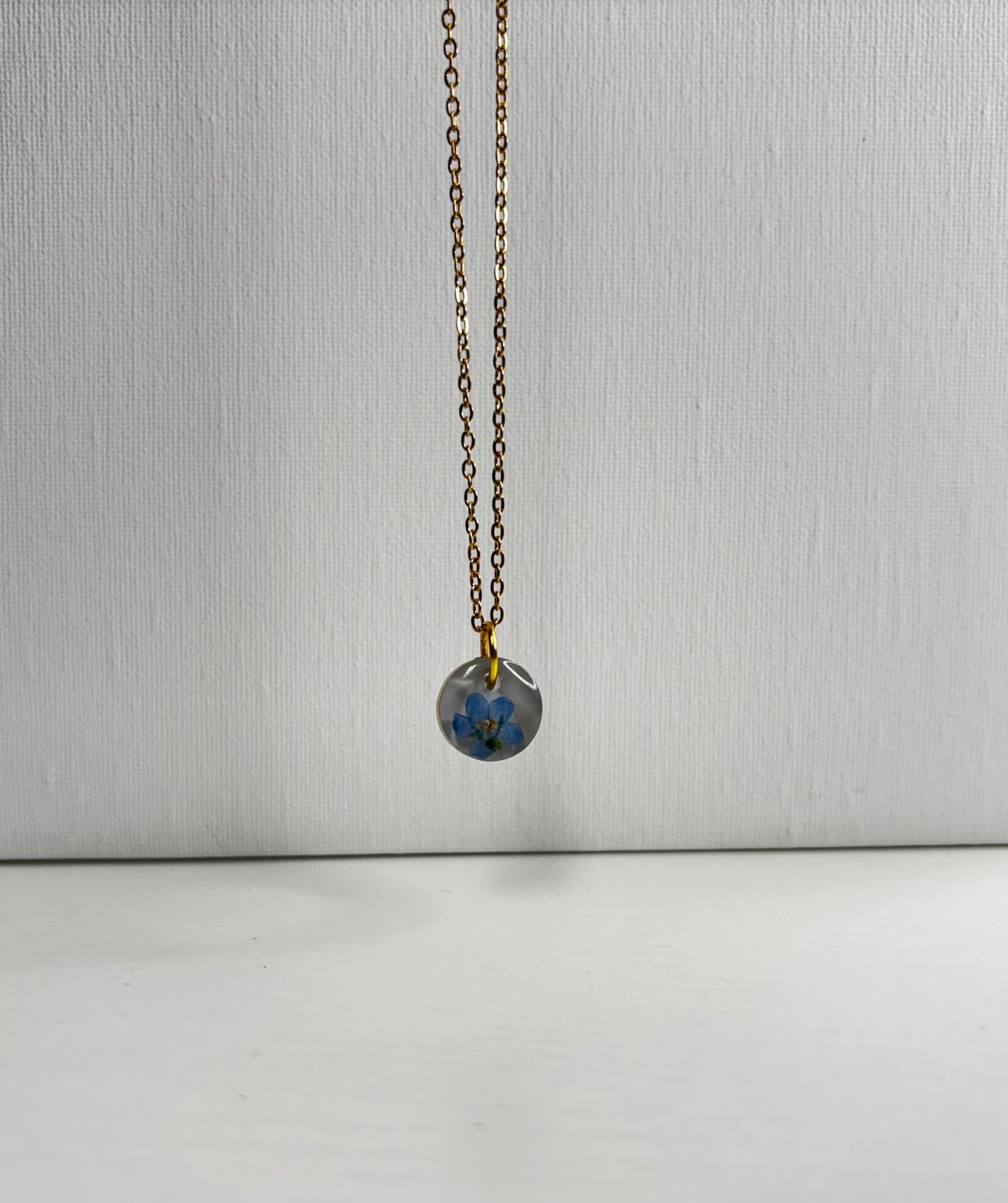 Blue and gold circle necklace