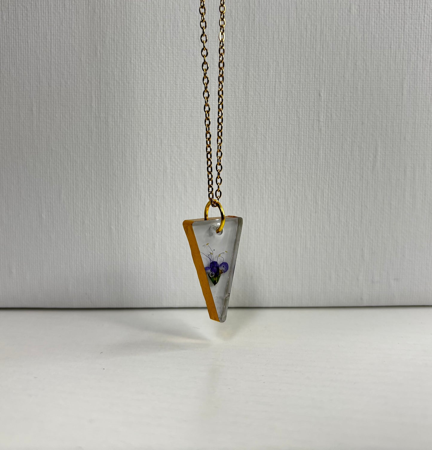 Purple and gold triangle necklace
